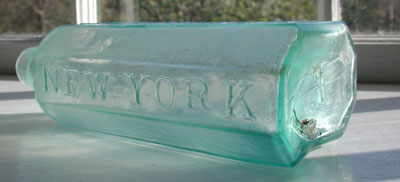 labeled pontiled new york medicine antique bottle